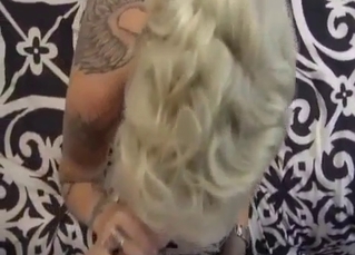 Tattooed blonde MILF blows her lovely nephew